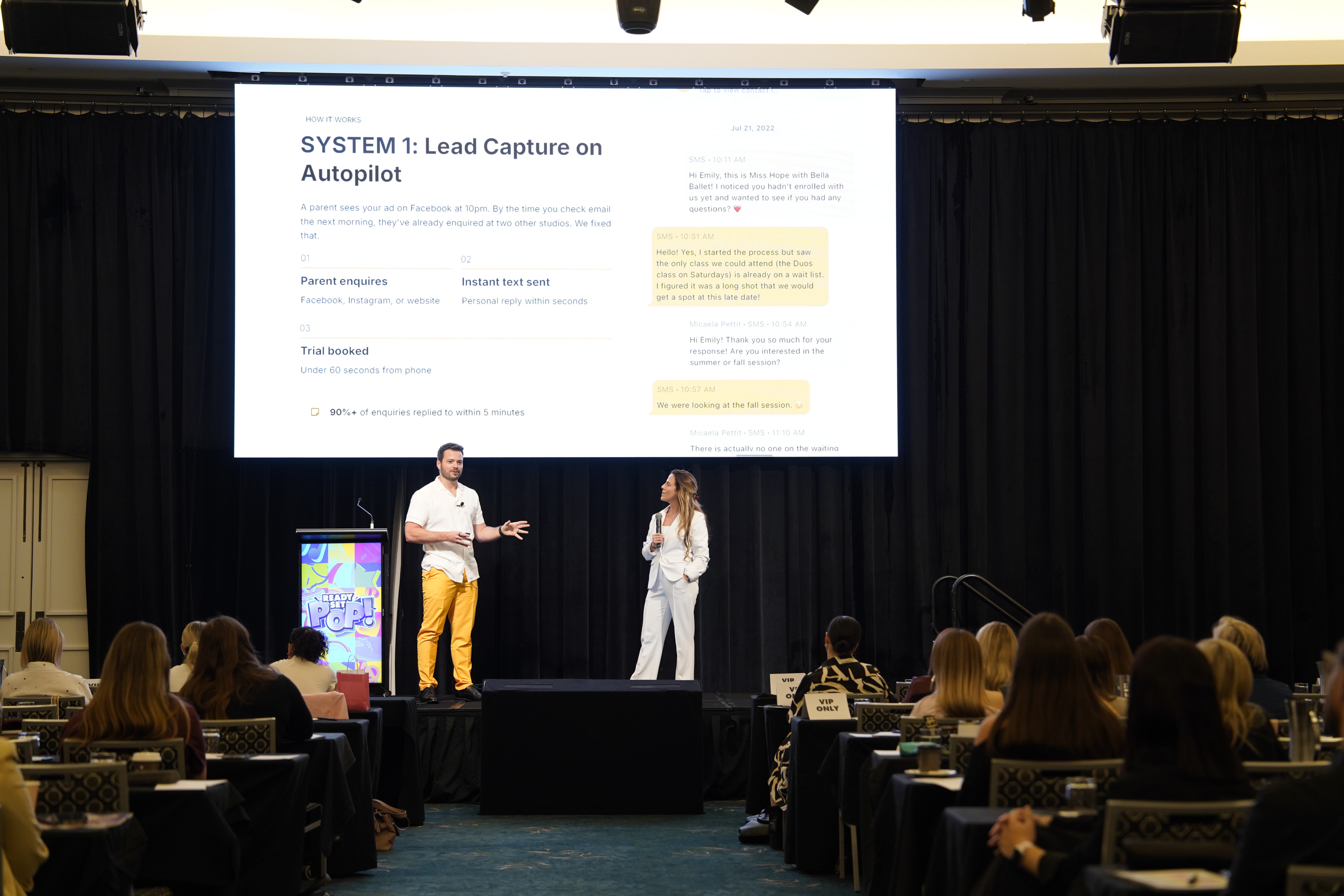 Brad and Hope presenting on stage